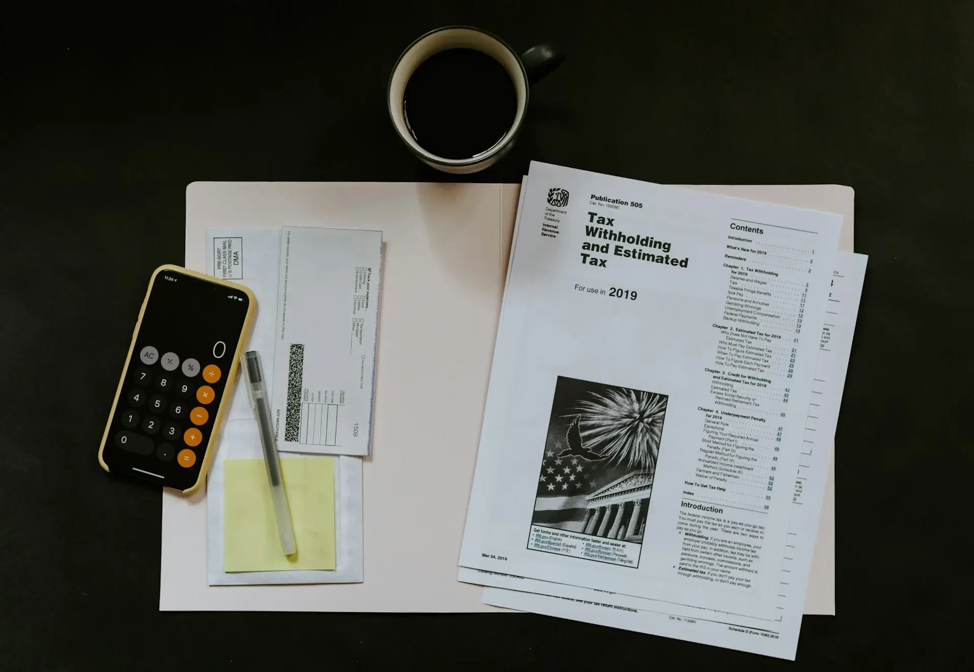 Business documents tax forms pen calculator and phone flat lay workspace for document editing services